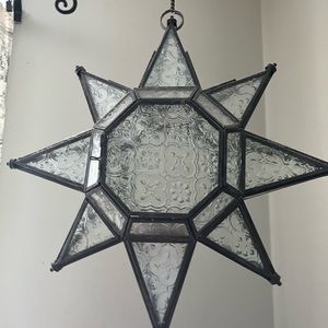 Glass and metal star hanging tea light lantern